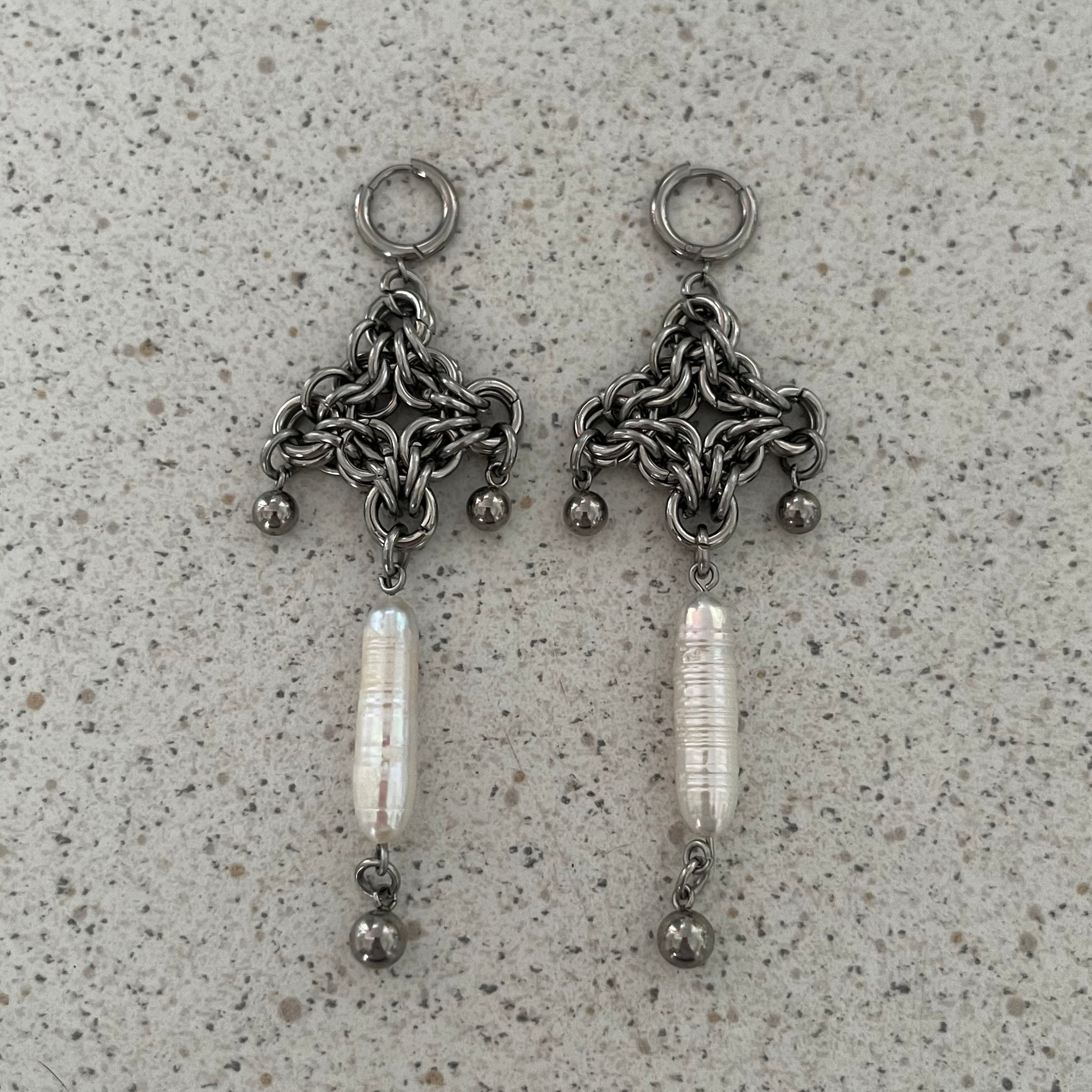 The “PEARL THONG” earrings