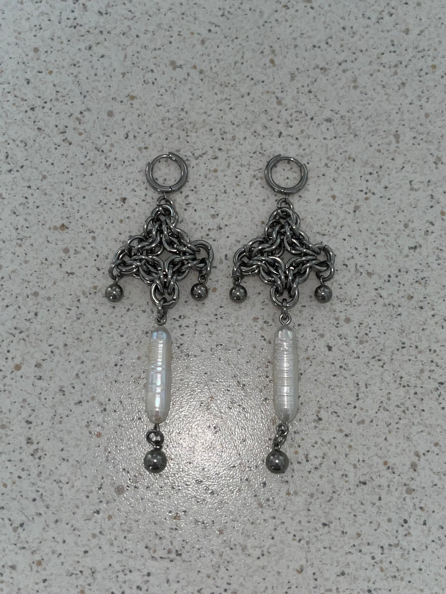 The “PEARL THONG” earrings